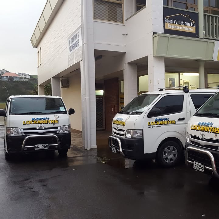 McCarthy's Locksmiths sign-written van fleet outside the Taupo Quay workshop